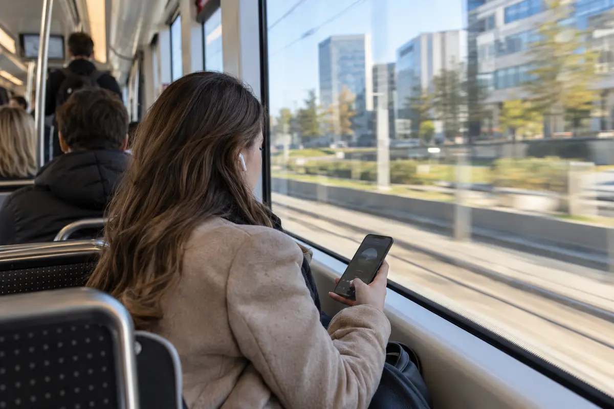 A commuter’s audio stream continues on a Luxembourg tram as the network changes