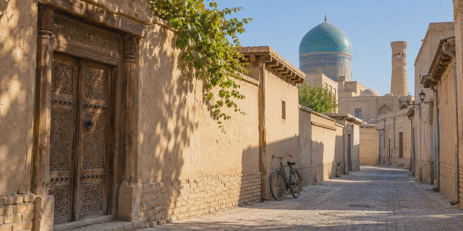 Quiet courtyard lane and tiled dome in Bukhara, Uzbekistan.