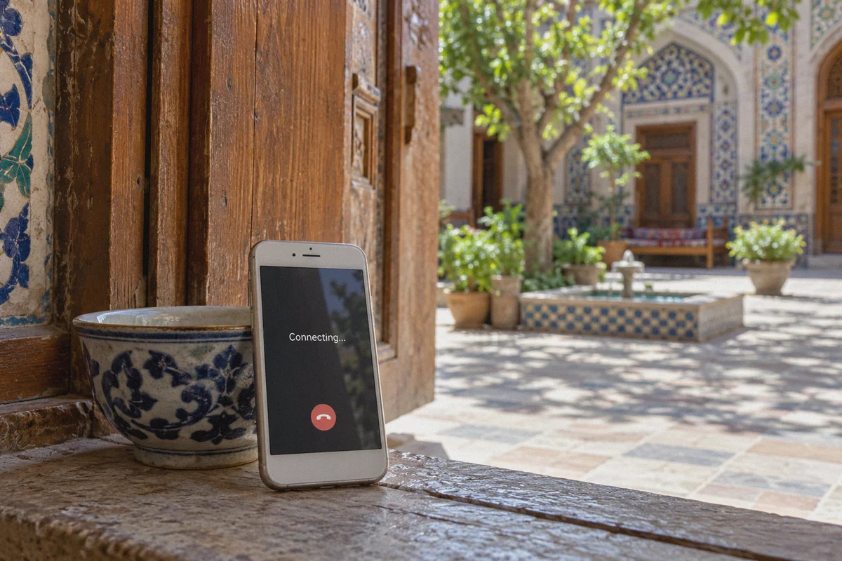 Phone waiting for a voice call to connect in a guesthouse.