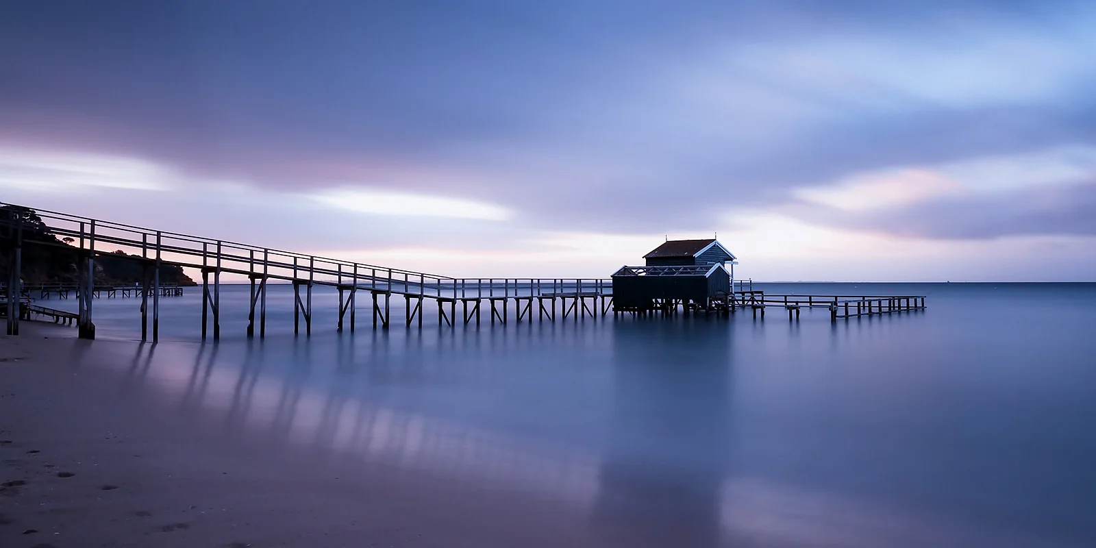 A quiet coastal arrival scene that evokes the start of a UK trip.