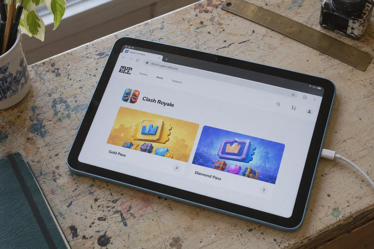 Clash Royale pass cards in the Supercell web store on a tablet.