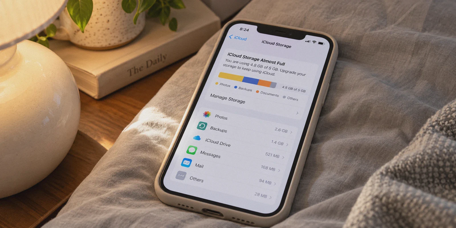 iPhone showing an almost-full iCloud storage bar.