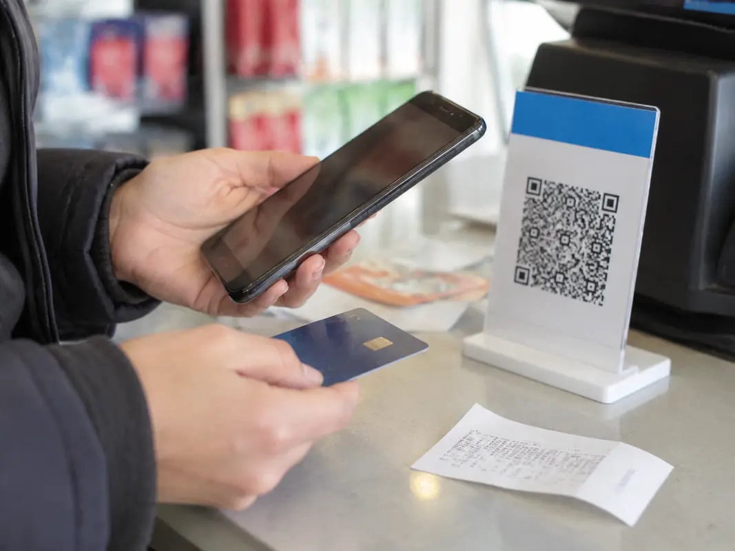 A QR payment works best when the phone, account, and backup plan are ready before the purchase.