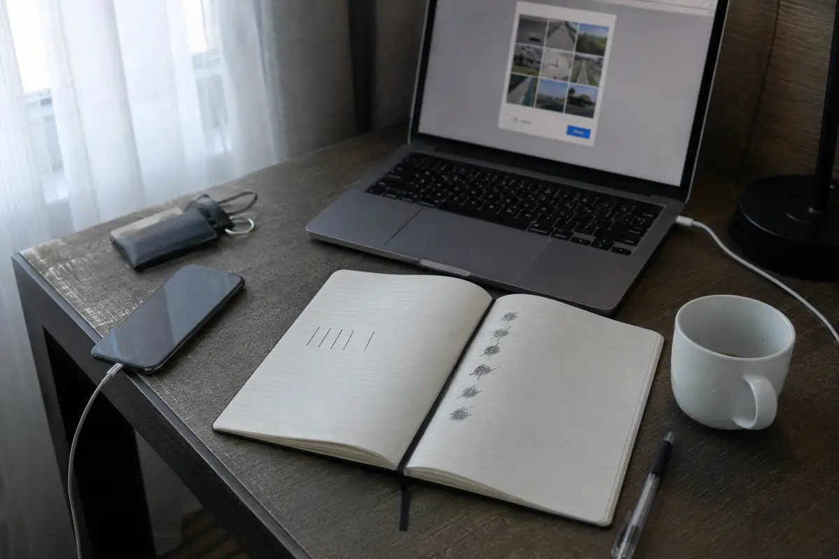A hotel notebook records repeated connection attempts beside a verification screen