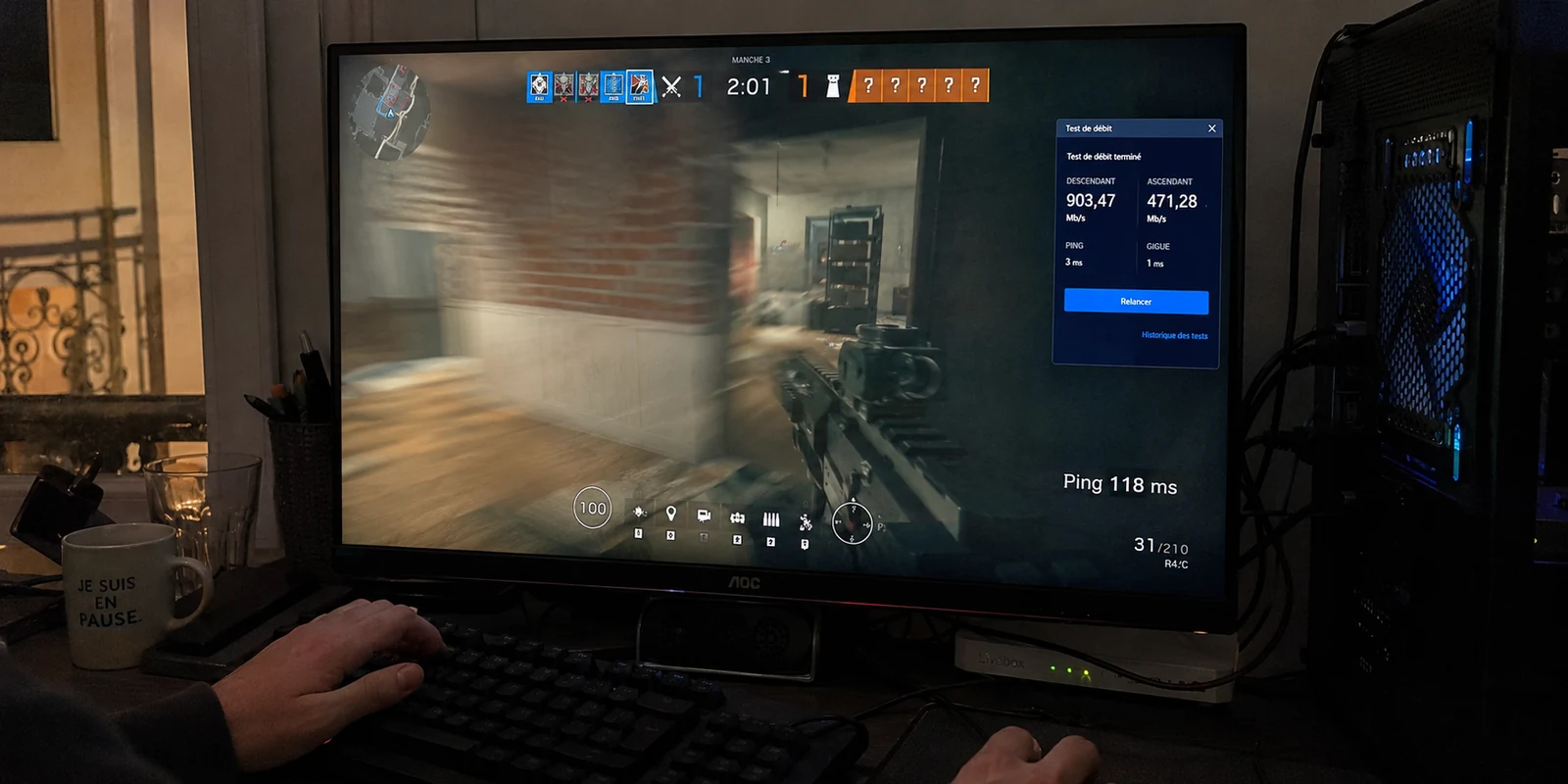 Partie en ligne perturbée par un pic de latence malgré un débit fibre proche de 900 Mb/s