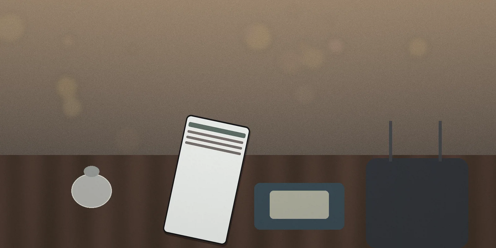 A smartphone, card and luggage at a hotel reception counter while traveling