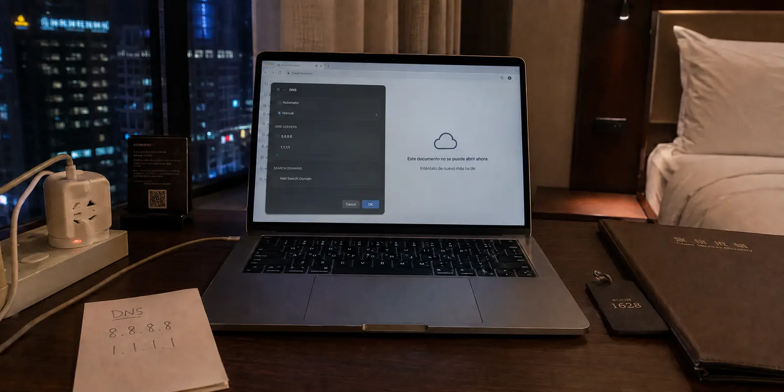 Un portátil en Shanghái muestra DNS personalizados mientras el documento en la nube sigue sin abrirse.